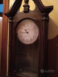 orologio a pendolo da parete