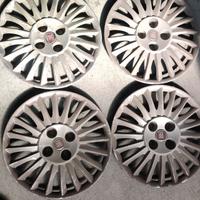 Fiat Grande Punto - 4 copricerchi originali 15"