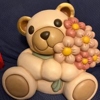 Teddy maxi con mazzo di fiori thun