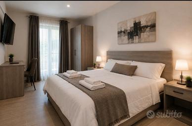 Mini Suite con bagno privato e cucina condivisa