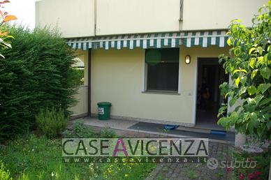PORZIONE DI QUADRIFAMILIARE CON GIARDINO