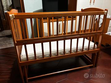 Lettino con sponde e dondolo