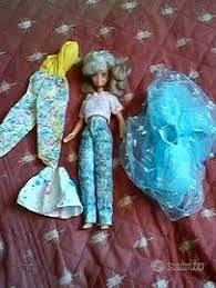 BARBIE Mattel orig. 1987 con 28 vesti,zaino, sedia