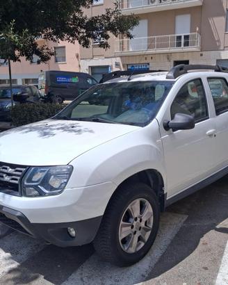 DACIA DUSTER LAUREATE 110CV- gomme nuove + dist ok