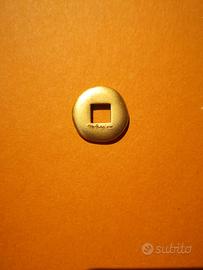 Moneta giapponese pomellato