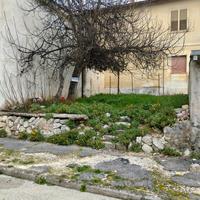 Appartamento e terreno edificabile