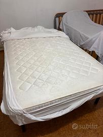 Letto completo una piazza e mezzo in ferro battuto
