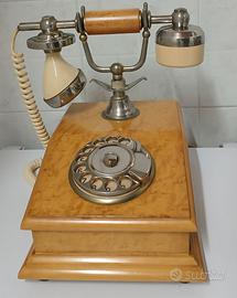 Antico telefono in radica con placca in oro