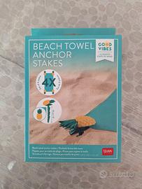 Set di 4 picchetti ananas ferma telo mare