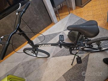 Nilox acciaio pieghevole nuova mai usata TRATTABII