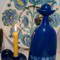 bottiglia più portacandela 