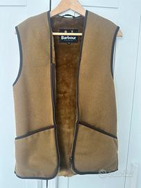 Gilet Barbour sotto giacca pellicciotto