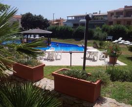 Appartamento trilocale giardino e piscina
