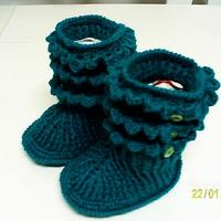 Scarpe e berrette per neonato