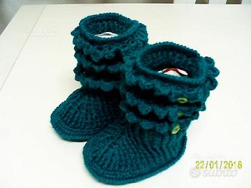 Scarpe e berrette per neonato