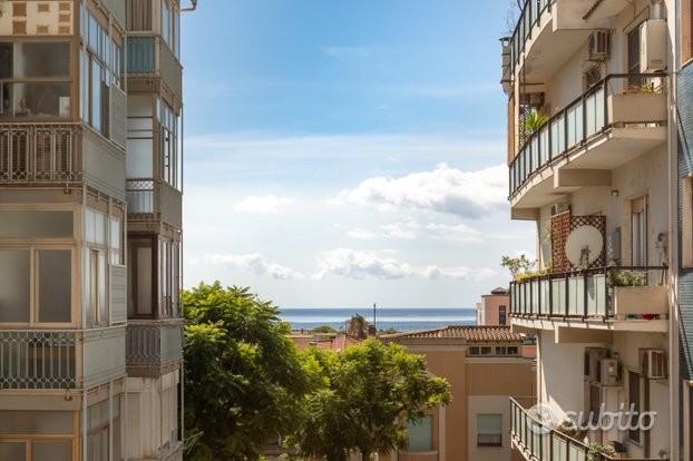 Trivano con scorcio mare e due bagni