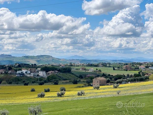 Attico con Vista Mozzafiato e Ampio Terrazzo