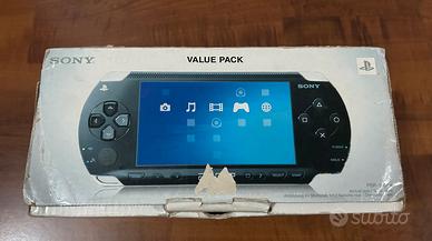 Console Playstation Psp 1004k con scatola e giochi