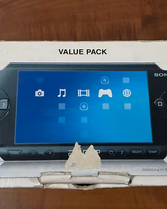 Console Playstation Psp 1004k con scatola e giochi