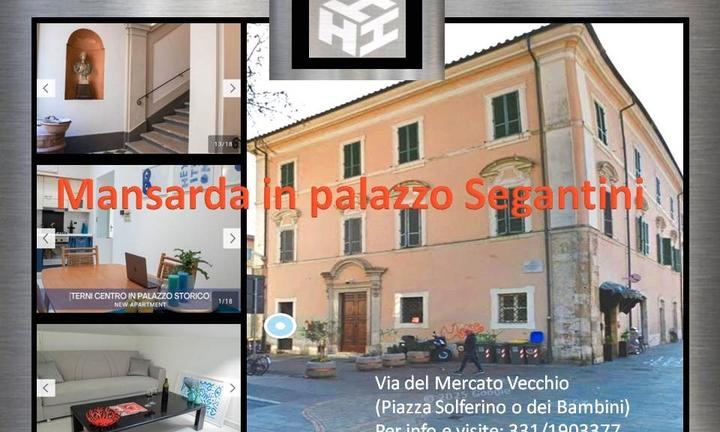 Raffinata mansarda in palazzo d'epoca