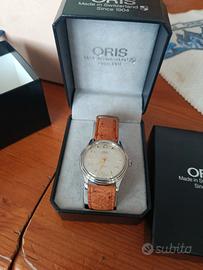 oris automatico data alle 12 corredato 