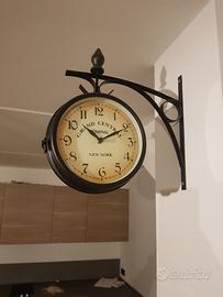 Orologio doppio da parete