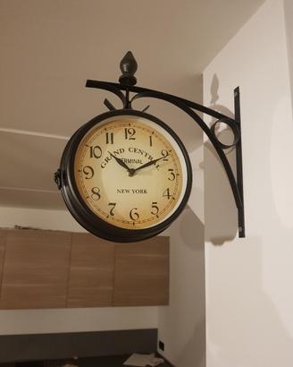 Orologio doppio da parete