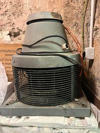 Vortice tira fumo per camino