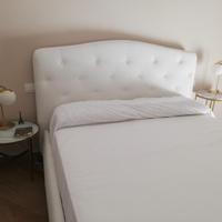 Letto matrimoniale contenitore in pelle