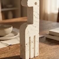 Giraffa in travertino stile Enzo Mari