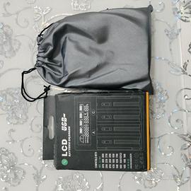 caricabatterie universale