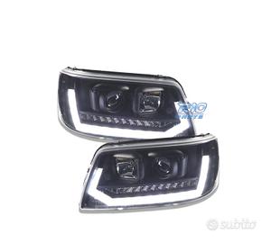 FARI VOLKSWAGEN VW T5 03-09 NUOVO LOOK CON FRECCIA