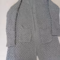 maglione lungo aperto da donna 