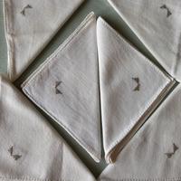 Set 6 tovaglioli ricamati e orlati a mano in lino