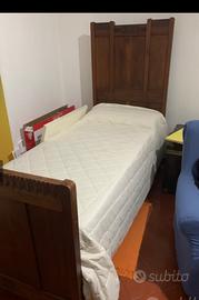 Due letti singoli con doghe