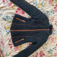 Giacca trapuntata blu con dettagli arancioni