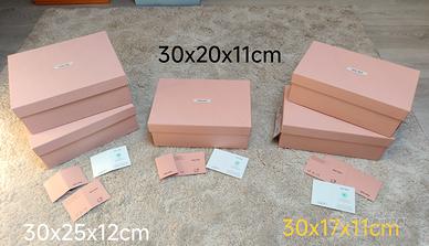 scatole Miu Miu rosa di tre dimensioni 