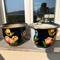 Coppia di coprivasi in ceramica smaltata