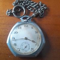 orologio e carta moneta antica