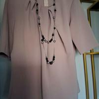 Blusa Caractère elegante e versatile