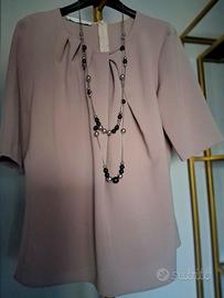 Blusa Caractère elegante e versatile