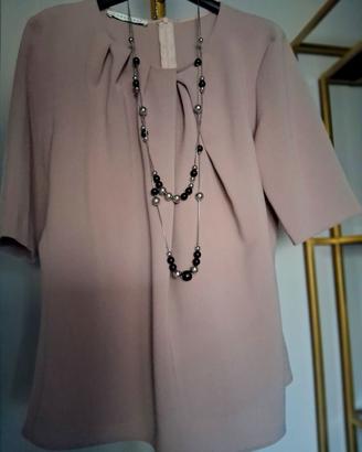 Blusa Caractère elegante e versatile