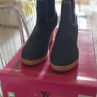 Stivali in jeans con zeppa n 39
Enrico Coveri 