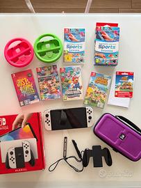 Nintendo Switch OLED Bianca + 5 Giochi + accessori