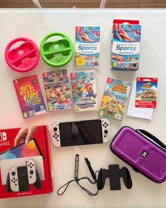 Nintendo Switch OLED Bianca + 5 Giochi + accessori