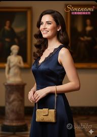 pochette  in cordino lurex oro all'uncinetto 