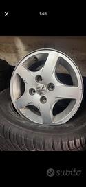 4 CERCHI IN LEGA PEUGEOT  206 + bulloni