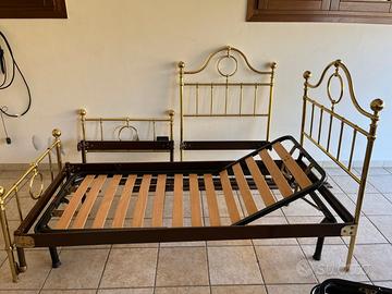 Testate in ottone on struttura letto