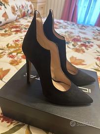 Scarpe Identità