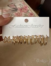 6 paia di orecchini color oro